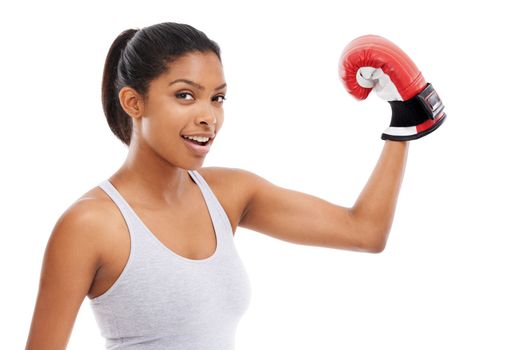 Shes fighting fit. A gorgeous young woman wearing boxing gloves.