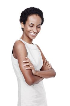 Shes got a winning smile. Studio shot of a confident woman posing against a white background.