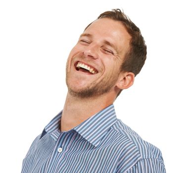 Laughter is the best medicine for corporate stress. Studio shot of a handsome young man laughing out loud against a white background.