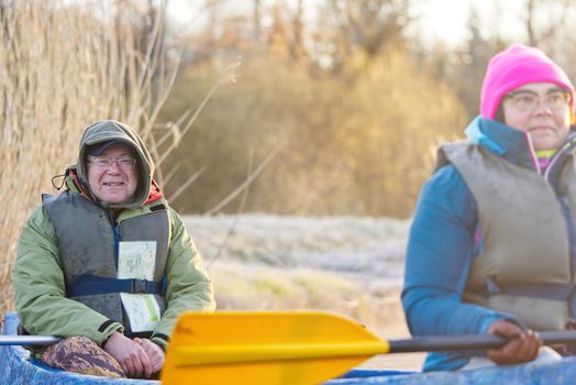 Seniors kayaking, activity. Happy senior. Active elderly concept around the world