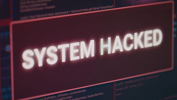 Display with system hacked message and security breach alert