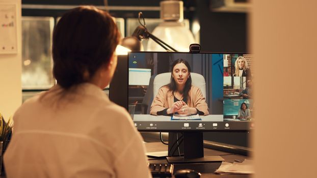 Empowered employee using videocall conference to talk to coworkers