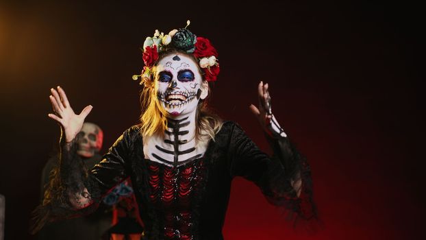 Horror lady of death screaming loud dressed in costume