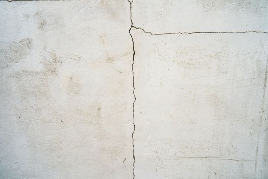 Crack cement wall building texture, damaged concrete at house.