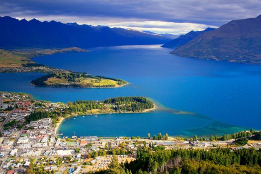 Above Queenstown and Lake Wakatipu in south Island, New Zealand at sunset