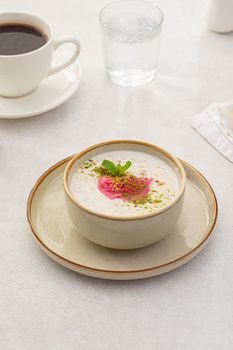 Mixed cereal porridge with berry sorbet
