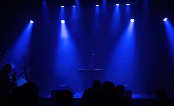 Light on a free stage, scene with blue spotlights scene