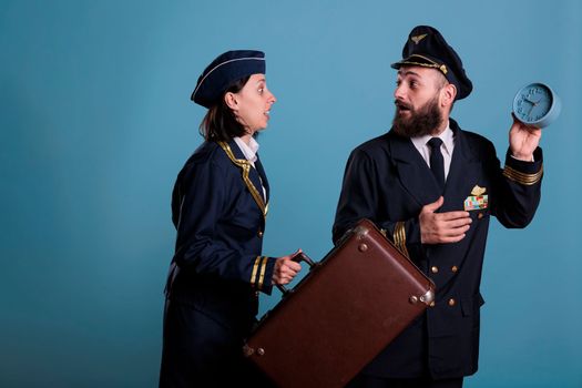 Flight attendant and pilot running late at airport