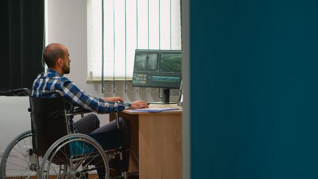 Photo designer with disability creating content