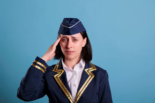 Flight attendant having migraine symptom