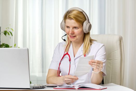Online consultation doctor Virtual doctor visit telemedicine concept giving advice over laptop