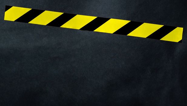 Yellow tape with black and yellow stripes