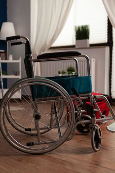 Wheelchair in empty room with disability facility