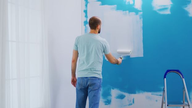 Covering wall blue paint