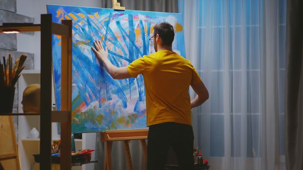 Impressionism painter in art studio