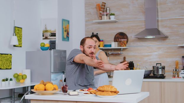 Angry entrepreneur during breakfast