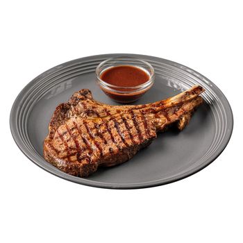 Isolated plate of grilled beef steak bone