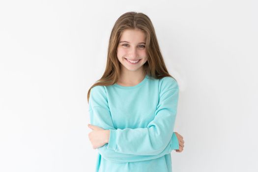 Smiling teenage girl with loose hair