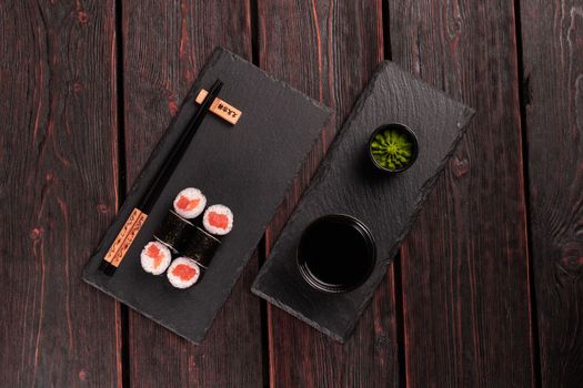 Maki sushi rolls with smoked salmon - Sushi menu. Japanese food concept