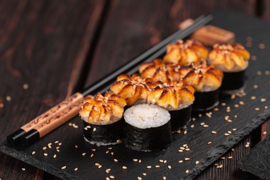 Japanese hot maki roll sushi with shrimp - asian food concept