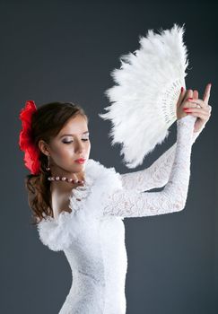 woman posing in flamenco white costume