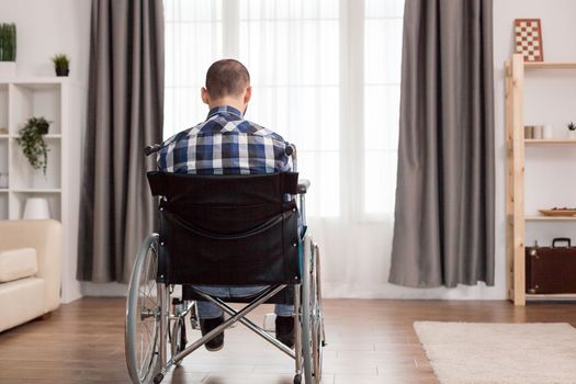 Paralyzed man in wheelchair