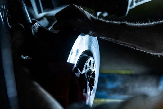 Mechanic hands maintenance brakes