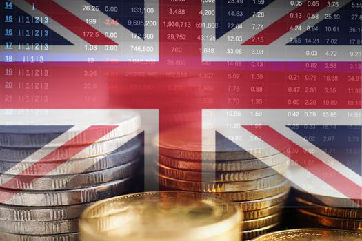 United Kingdom flag with stock market finance, economy trend graph digital technology.