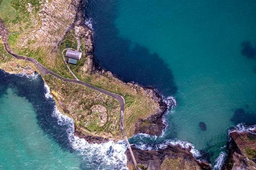 Aerial view of Ballintoy Harbour near Giants Causeway, County. Antrim, Northern Ireland, UK