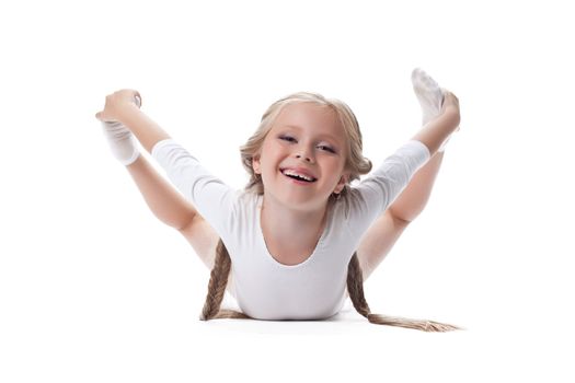 Happy girl performing gymnastic exercises