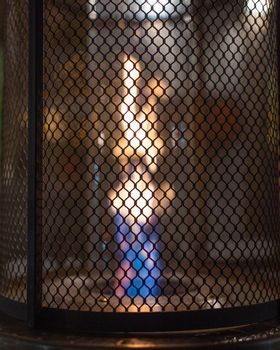 Close up of gas flame heater at night