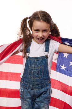 Happy little citizen of United States of America- lovely baby girl wrapping USA flag. Citizenships. Independence Day