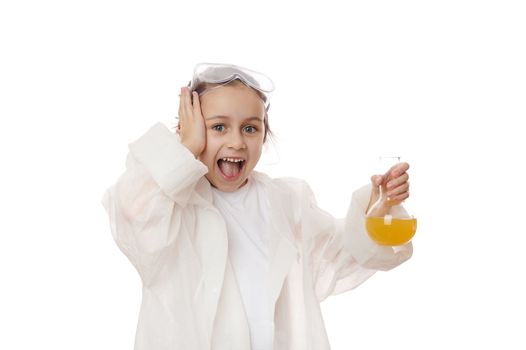 Excited Kid conducting scientific experiment or chemical reaction at chemistry laboratory, isolated on white background