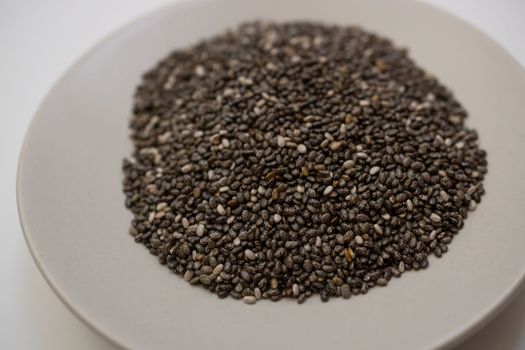 chia seeds on a white plate