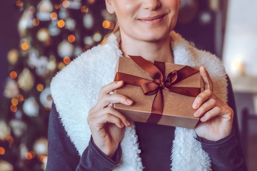 Happy Woman with Christmas Gift