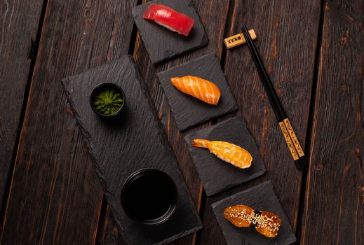 Delicious Sushi Nigiri on wooden background. Traditional Japanese cuisine