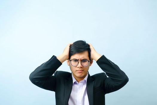 Portrait of businessman stressed and frustrated from work.