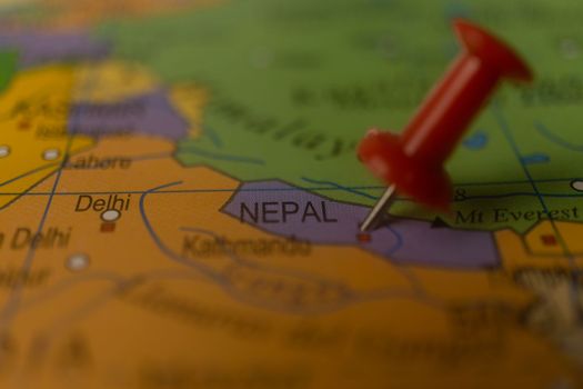 nepal marked on the map with a thumbtack