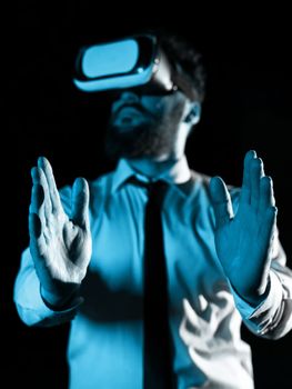 Man Wearing Vr Glasses And Presenting Important Messages Between Hands. Businessman Having Virtual Reality Eyeglasses And Showing Crutial Informations.