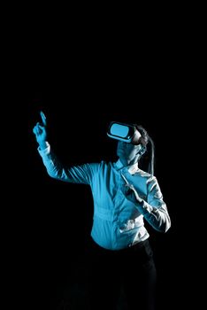 Woman Wearing Vr Glasses And Pointing On Important Messages With One Finger. Businesswoman Having Virtual Reality Eyeglasses And Showing Crutial Informations.