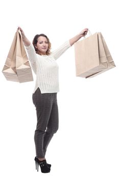 casual young woman with shopping bags. isolated on a white