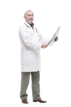 elderly competent doctor with a x-ray in his hands.