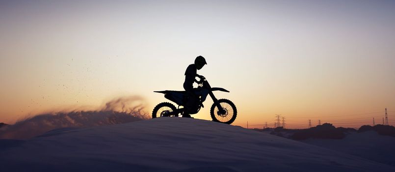 Motorcycle, sport and silhouette of man on bike at night, sky and background in nature. Fitness sports, exercise biking or motorbike person driving on dirt sand, hill mountain or desert for health