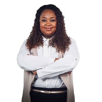 Proud, portrait and business woman in studio, empowered and confident on white background. Face, leader and black woman standing in power, ambition and confidence, assertive and positive or isolated