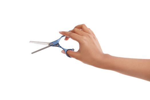 Time for a new style. a woman holding a pair of haircutting scissors.