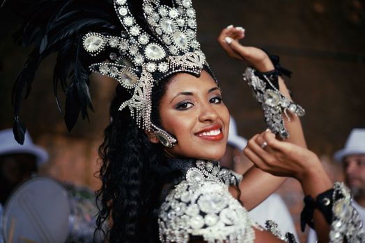Shes got samba in her blood. Portrait of a beautiful samba dancer performing in a carnival.