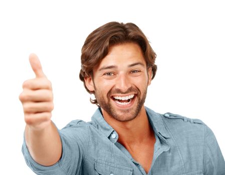 Thumbs up, OK and man with smile, portrait with hand sign, yes and thank you with feedback against white background. Happy man, agreement and success with motivation for winner and vote in portrait
