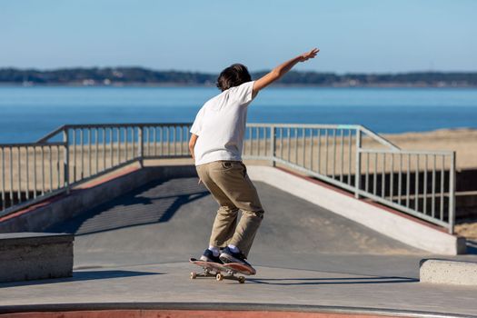 young man jumping in a skatepark