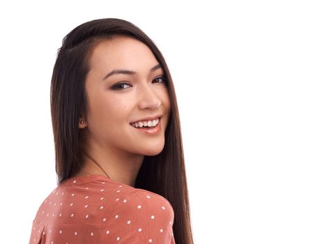 Beautiful, young woman and smile for beauty profile or empowerment against a white studio background. Portrait of a isolated female smiling in happiness, vision or satisfaction on white background