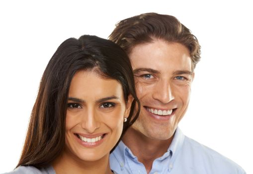 Partners in life. Head and shoulders portrait of a happy young couple isolated on a white background.